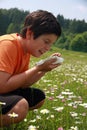 Allergic child with handkerchief Royalty Free Stock Photo