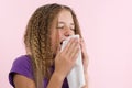 Allergic rhinitis on a summer vacation in a teenage girl`s journey. Royalty Free Stock Photo