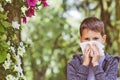 Allergy. Little boy has allergies from flower pollen Royalty Free Stock Photo