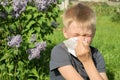 Allergy to flower pollen, spring, the boy with scarf Royalty Free Stock Photo