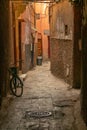 Alley with bicycle from the medina of Marrakech. Morocco Royalty Free Stock Photo