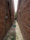 Alley between brick buildings