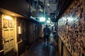 Alley at the Golden Gai, Shinjuku at night. Raining day. Landscape Orientation