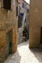 An alley in the historic center of Giglio Castello, Tuscany Italy Royalty Free Stock Photo