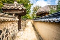 Alley with houses walls and gates in historic Hahoe folk village Andong South Korea