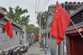 Alley of Hutong with Chinese flag for the celebration of National Day, Beijing, China