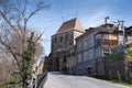 Alley leading to the Tailors Tower. Wide street view on a sunny day in spring