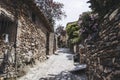 Castelnou, June 26, 2023, France - Alley in the Mediterranean hilltop village of Castelnou in France