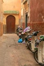 Alley with motorcycles from the medina of Marrakech. Morocco
