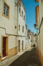 Alley with old colorful houses and deserted causeway Royalty Free Stock Photo