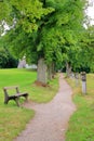 Alley in the old monastery park. Royalty Free Stock Photo