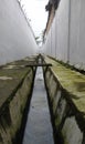 the alley between the prison walls Royalty Free Stock Photo