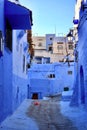 Alley in shades of blue in the blue city of Morocco