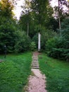 Alley with stairs made of sawn logs