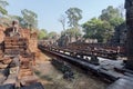 Alley on territory of the 12th century Preah Khan temple, Cambodia. Historical ruins in ancient forest in Angkor Royalty Free Stock Photo