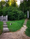 Alley with two stairs - stone steps and wooden steps