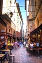 Alley with typical restaurants in Bologna, Italy Royalty Free Stock Photo