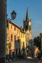 Alley and village church in Villars