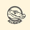 Alligator head in circle cut out icon