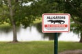 Alligator warning sign in Florida for awareness of imminent dang