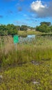 An alligator warning sign right behind a housing development in Florida.