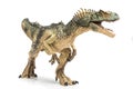 Allosaurus plastic figurine on white background Royalty Free Stock Photo