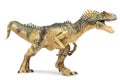 Allosaurus plastic figurine on white background