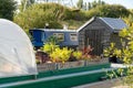 An allotment barge moored on the historic Forth and Clyde Canal at The Helix, Scotland, UK