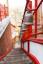 Alloy bell on the stairway in asian temple Royalty Free Stock Photo