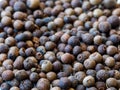 Allspice background. Jamaican pepper, pimento berry, allspice peppercorns or myrtle pepper Royalty Free Stock Photo