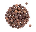 Allspice pile isolated on white background. Jamaican pepper, pimento berry, allspice peppercorns or myrtle pepper. Top Royalty Free Stock Photo