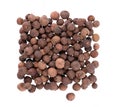 Allspice pile isolated on white background. Jamaican pepper, pimento berry, allspice peppercorns or myrtle pepper. Top Royalty Free Stock Photo