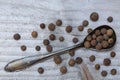 Allspice on a spoon macro Royalty Free Stock Photo