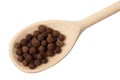 Allspice on wooden spoon Royalty Free Stock Photo