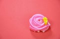 Allure colorful Thai candy with rose shape on red background