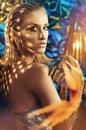 Alluring blond woman with golden dust on her body Royalty Free Stock Photo