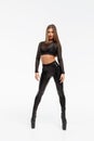 Erotic woman in leather pants and heels Royalty Free Stock Photo