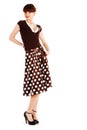 Alluring young girl in spotted skirt