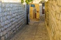 Ally with the Abuhav Synagogue sign, in Safed (Tzfat)