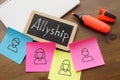Allyship is shown on the photo using the text