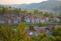 Alma Vii village in Transylvania, Romania, at sunset, with colorful houses. View from an elevated location Royalty Free Stock Photo