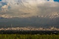 Almaty city panoramic view, Kazakhstan. Cloudy sky, mountains Royalty Free Stock Photo