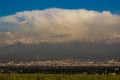 Almaty city panoramic view, Kazakhstan. Cloudy sky, mountains Royalty Free Stock Photo
