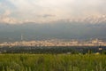 Almaty city panoramic view, Kazakhstan. Cloudy sky, mountains Royalty Free Stock Photo