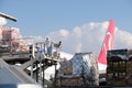 Almaty / Kazakhstan - 04.18.2020 : Airport staff and medics unload humanitarian cargo Turkish Cargo