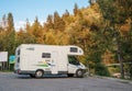 Almaty, Kazakhstan - August 18, 2023: A Ford Transit motorhome sits in a parking lot in the mountains