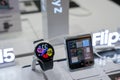 Almaty, Kazakhstan - August 17, 2023: Smart watch6 and samsung galaxy zflip5 smartphone on the storefront