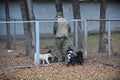 Almaty, Kazakhstan - 11.04.2014 : A dog handler prepares for training with a service dog