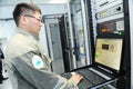 Almaty, Kazakhstan - 11.20.2015 : Employees of the mission control center of the KAZSAT satellite monitor telemetry data