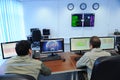 Almaty, Kazakhstan - 11.20.2015 : Employees of the mission control center of the KAZSAT satellite monitor telemetry data